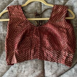 Elegant Black Top with Lace Trim and Sleeveless Design